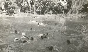 Cooling off in river.